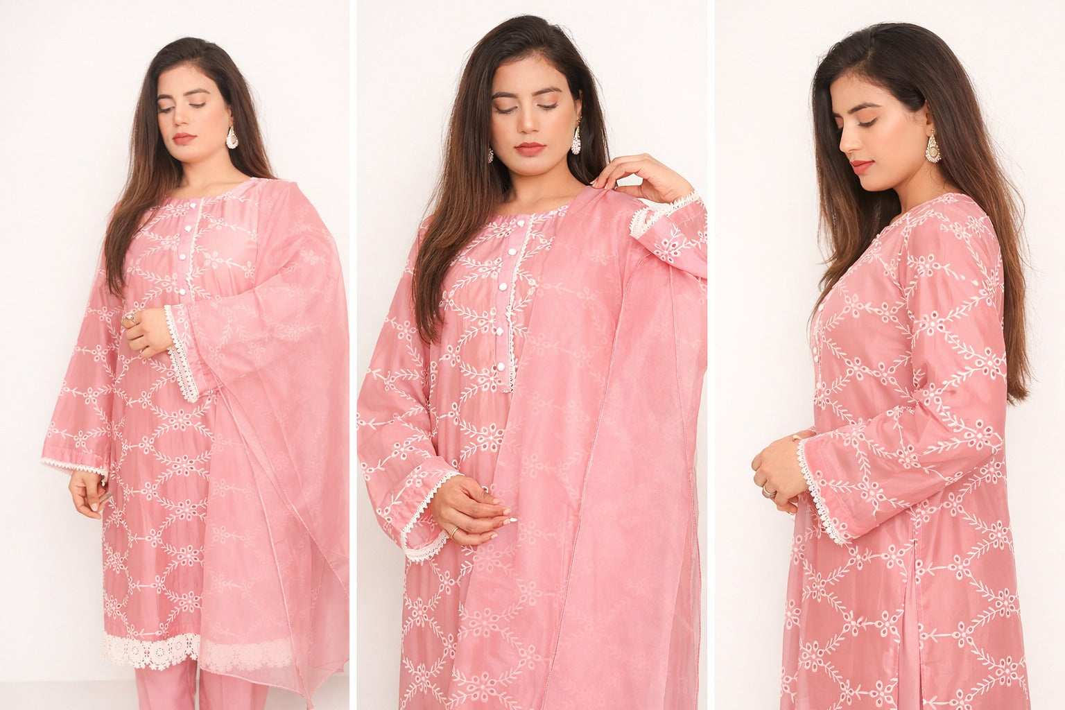 Woman wearing a pink traditional outfit with white patterns on a white background.