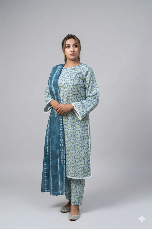 Woman wearing a light blue floral kurta with a matching dupatta on a gray background