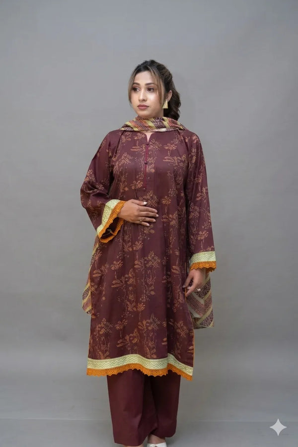 Woman wearing a maroon traditional outfit with gold accents on a gray background
