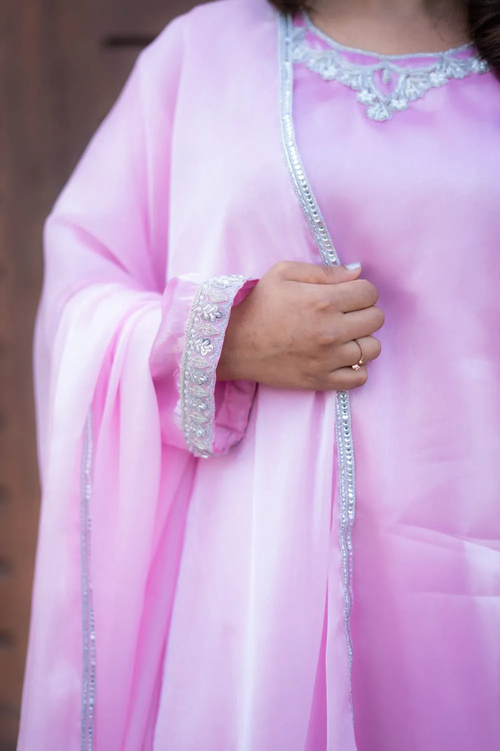 Pink traditional outfit with silver embellishments