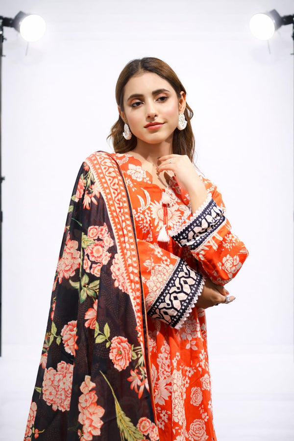 Woman wearing a colorful floral dress with a white background