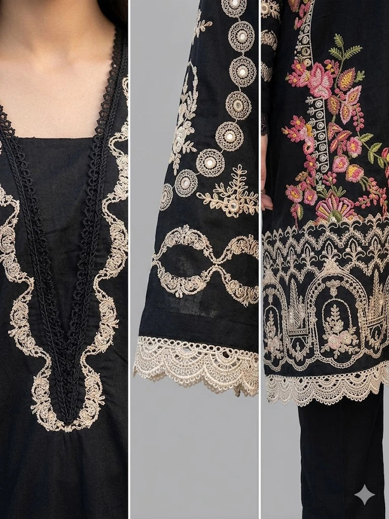 Black embroidered garment with intricate patterns on a gray background